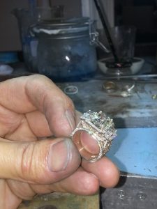 diamond engagement ring setting completed by master jeweler