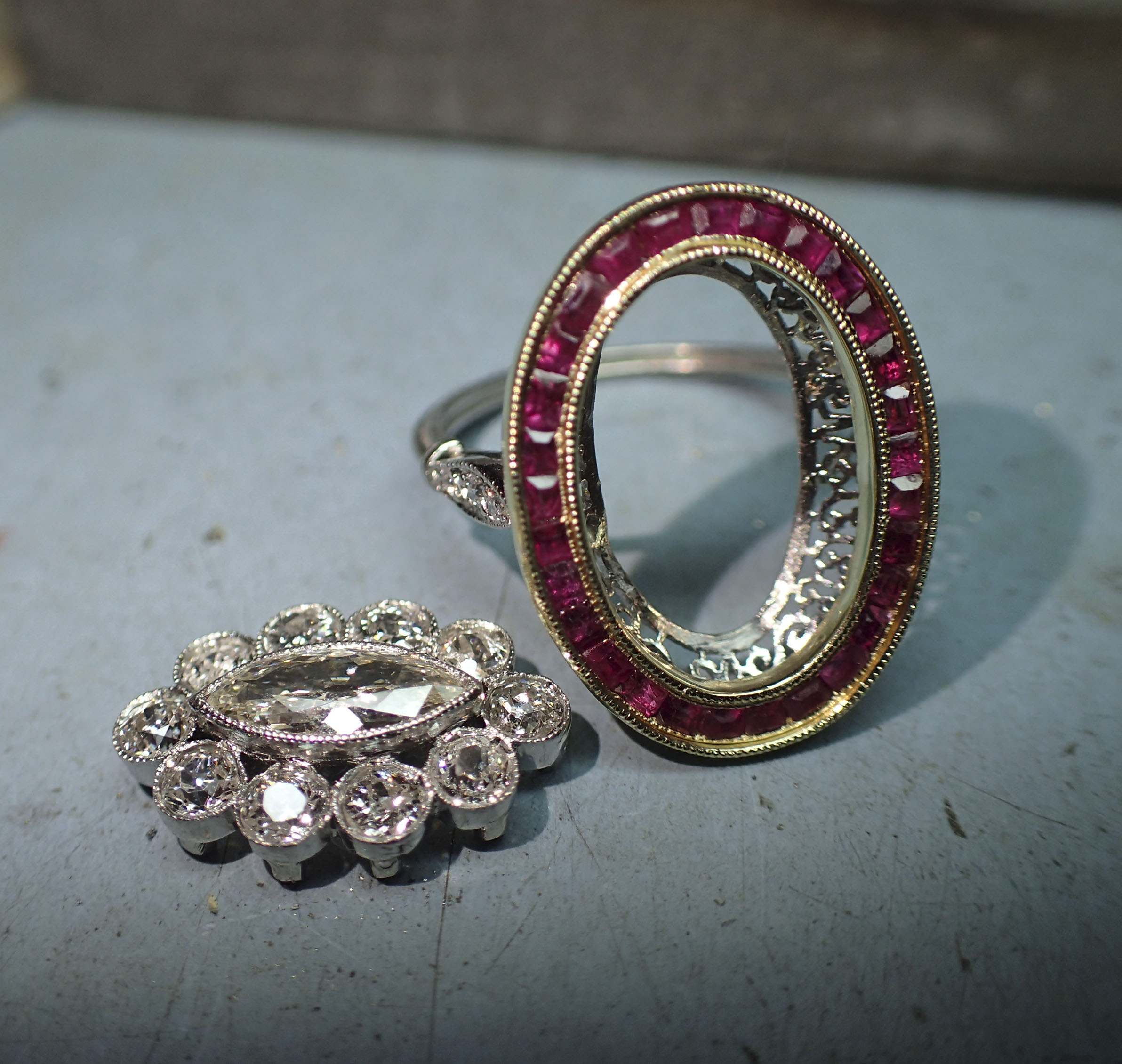 restored vintage ruby halo and diamond ring marquise center diamond